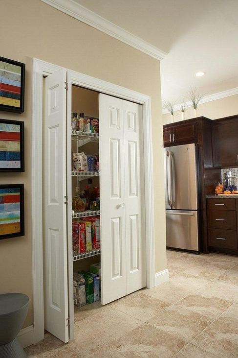 Bi-Fold Pantry Doors in Kitchen - Iowa Remodels