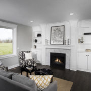 Fireplace With Built-in White Cabinets