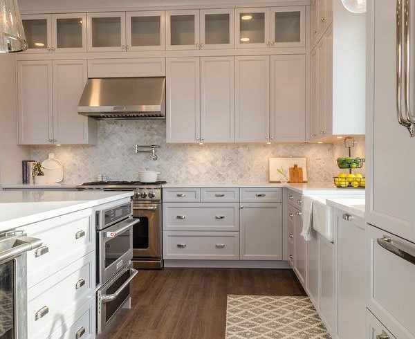 Stainless Steel Stove Hood with White Cabinets